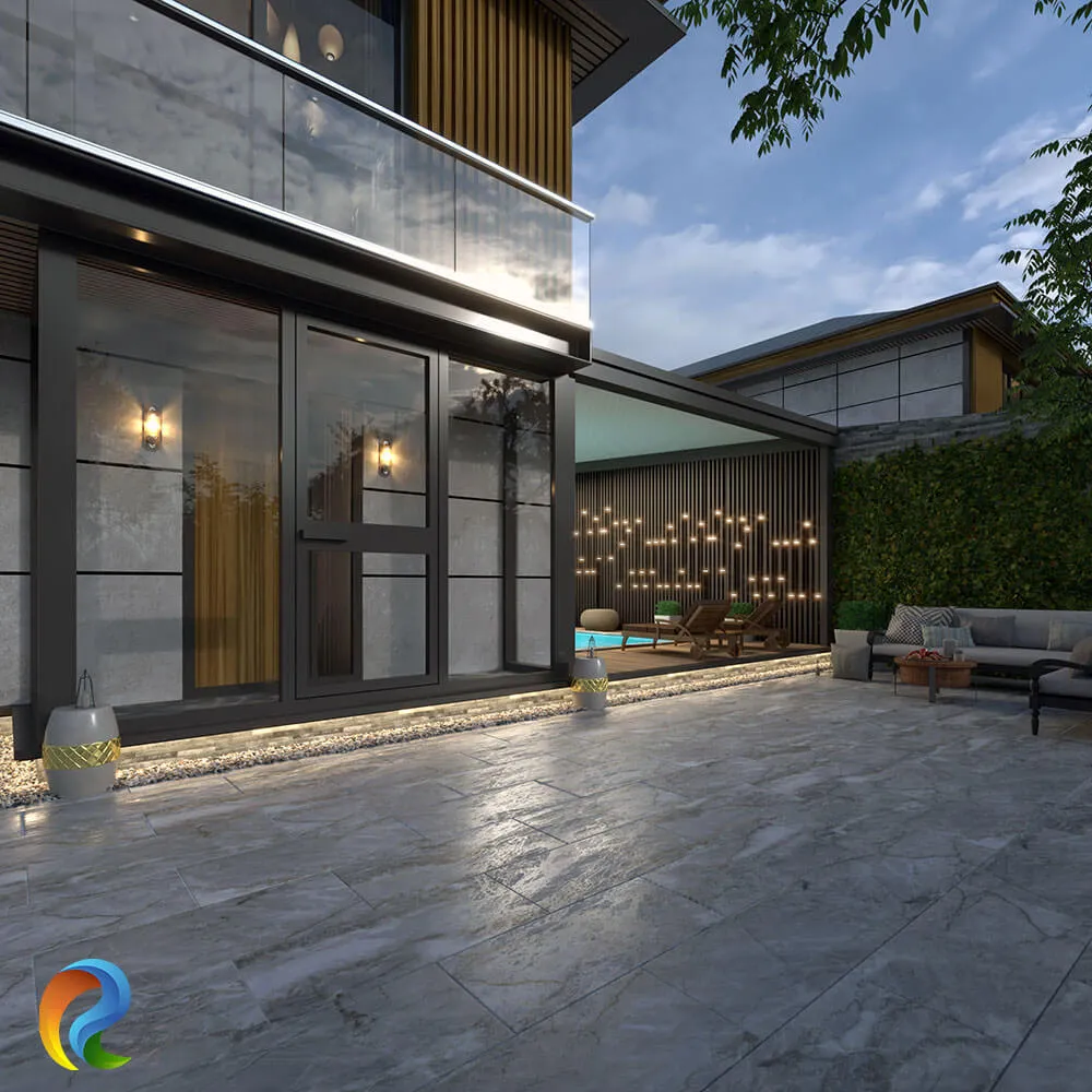 Geniş cam cepheleri, cam balkonları, dekoratif duvar aydınlatmaları ve açık oturma alanı bulunan modern lüks villa