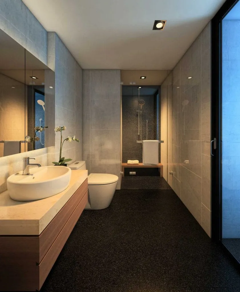 Gri seramik kaplamalar, ahşap lavabo dolabı ve cam duş alanıyla tasarlanan modern banyo iç mekân renderı