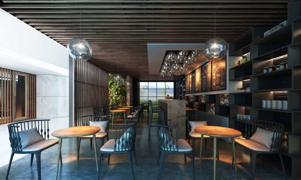 Ahşap tavan detayları, bar bölümü ve modern oturma alanlarıyla tasarlanan kafe iç mekân renderı