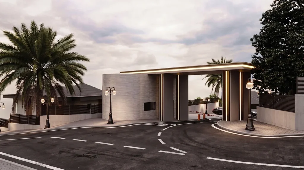 Güvenlik kulübesi, kontrollü araç geçişi, dekoratif aydınlatmalar ve palmiye peyzajı bulunan modern villa sitesi girişi
